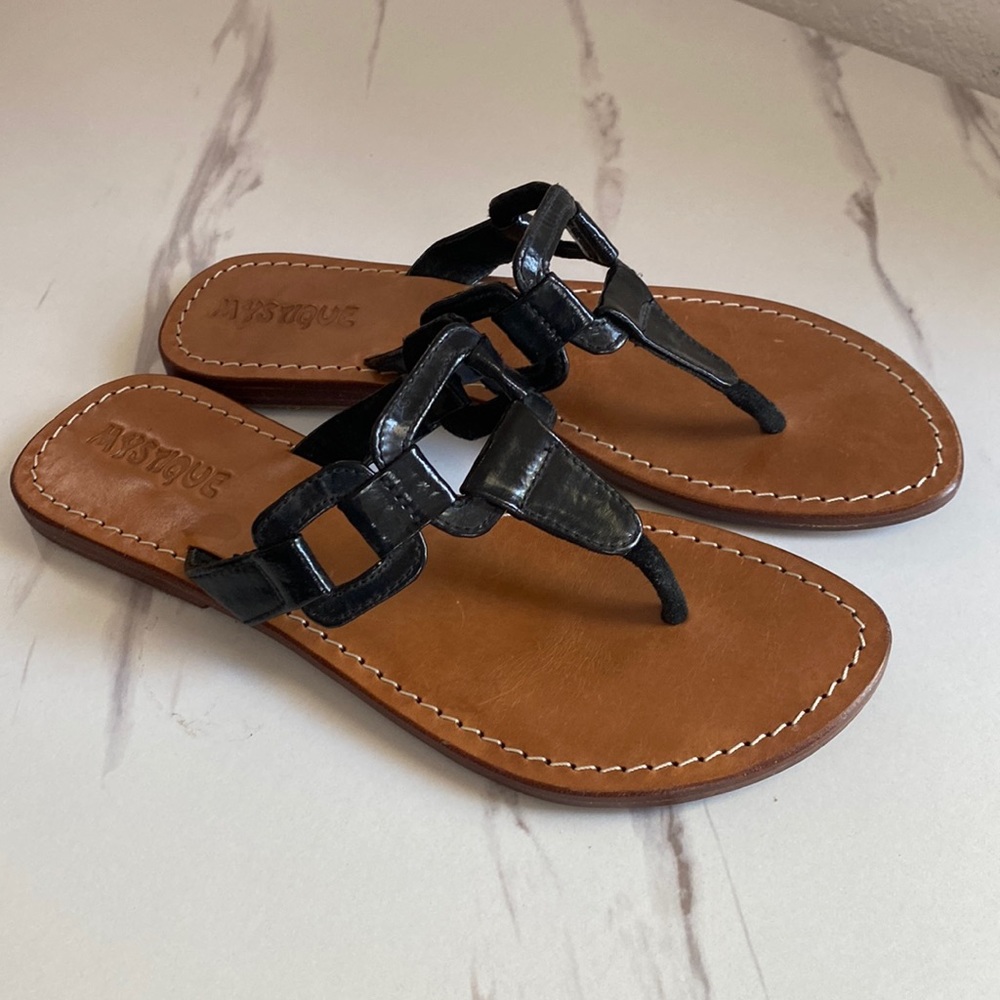 Mystique black patent leather and suede sandals. Size 7, fits narrow.
